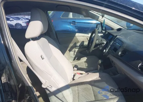 2011 Honda Insight from USA, damaged, VIN JHMZE2H36BS006488